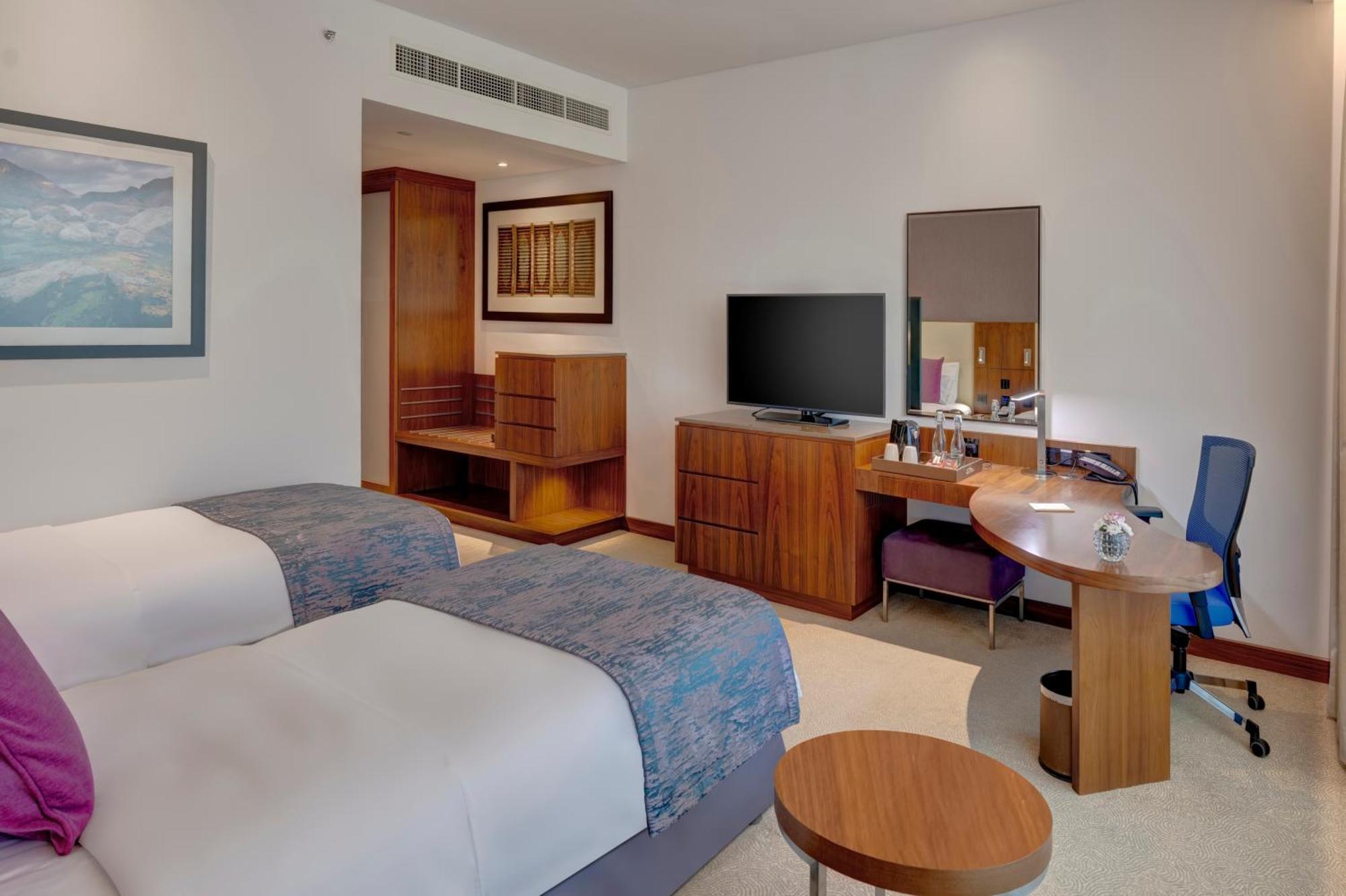 Standard Zweibettzimmer mit Gartenblick und Zugang zur Lounge